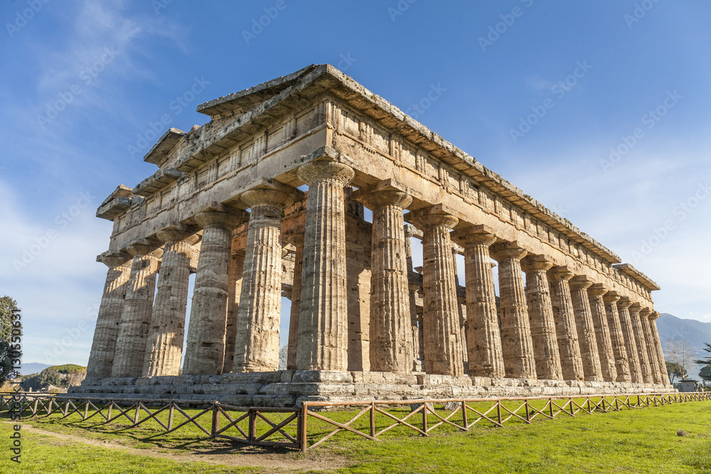 Rear view of greek temple of Neptune, in the archaeological site of Paestum, Salerno, Italy