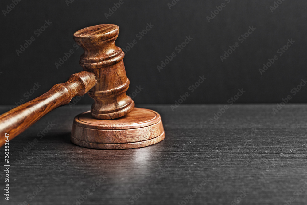 Judge's Gavel over black background Judge's Gavel over black background