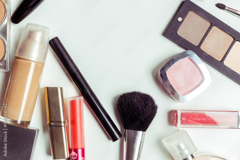 Brush and cosmetic isolated on a white background. Top view. Brush and cosmetic isolated on a white background. Top view.