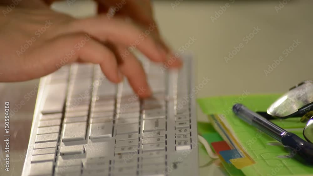 Woman hands typing on computer keyboard at office Woman hands typing on computer keyboard at office