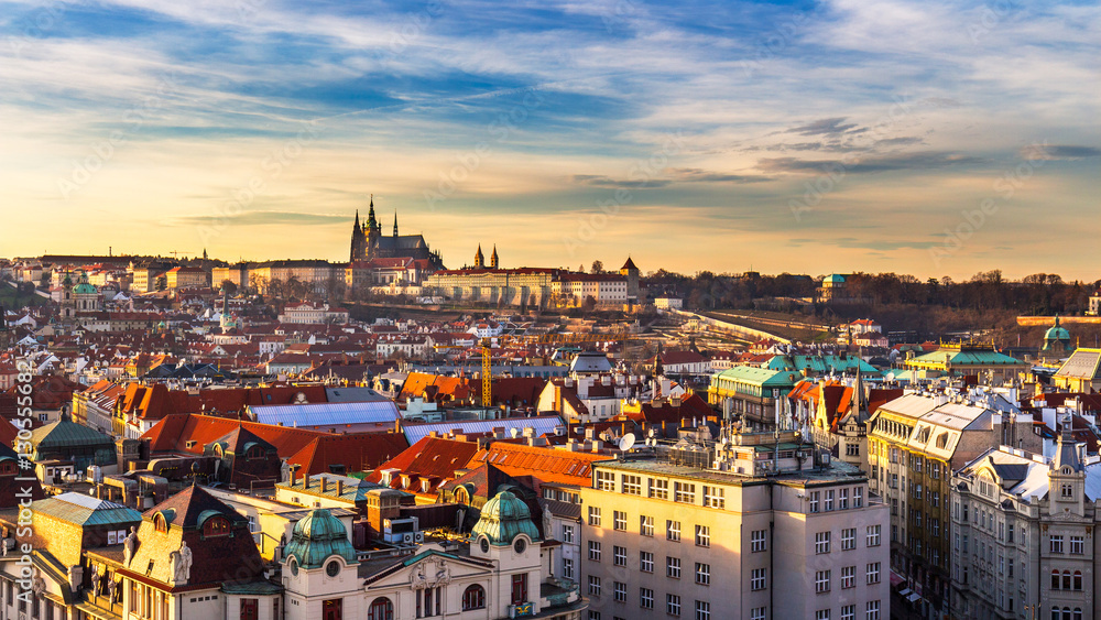Naklejka premium Buildings and landmarks of old town with red rooftops and multi-coloured walls. Prague, Czech Republic.