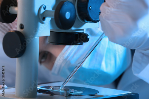 Scientist making experiment...