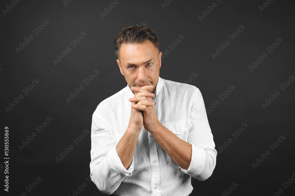 Handsome man on black background Handsome man on black background