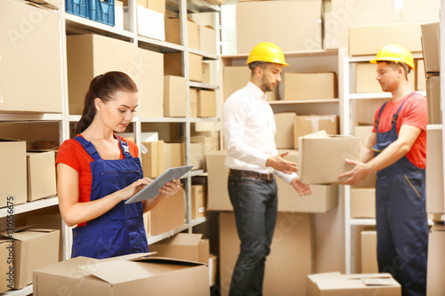 Business people working at warehouse