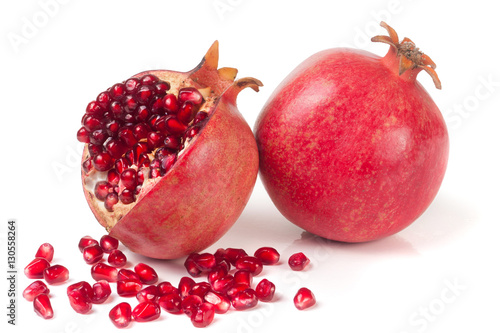 two pomegranate isolated on a white background