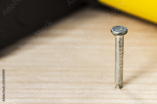 hobnail / metal nail in wood
