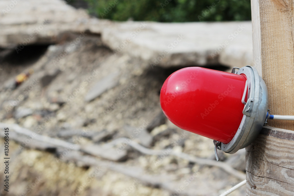 Red warning light which enclosing the ditch, where the repair of water pipes