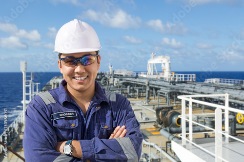 Portrait asian engineer on the ships deck.