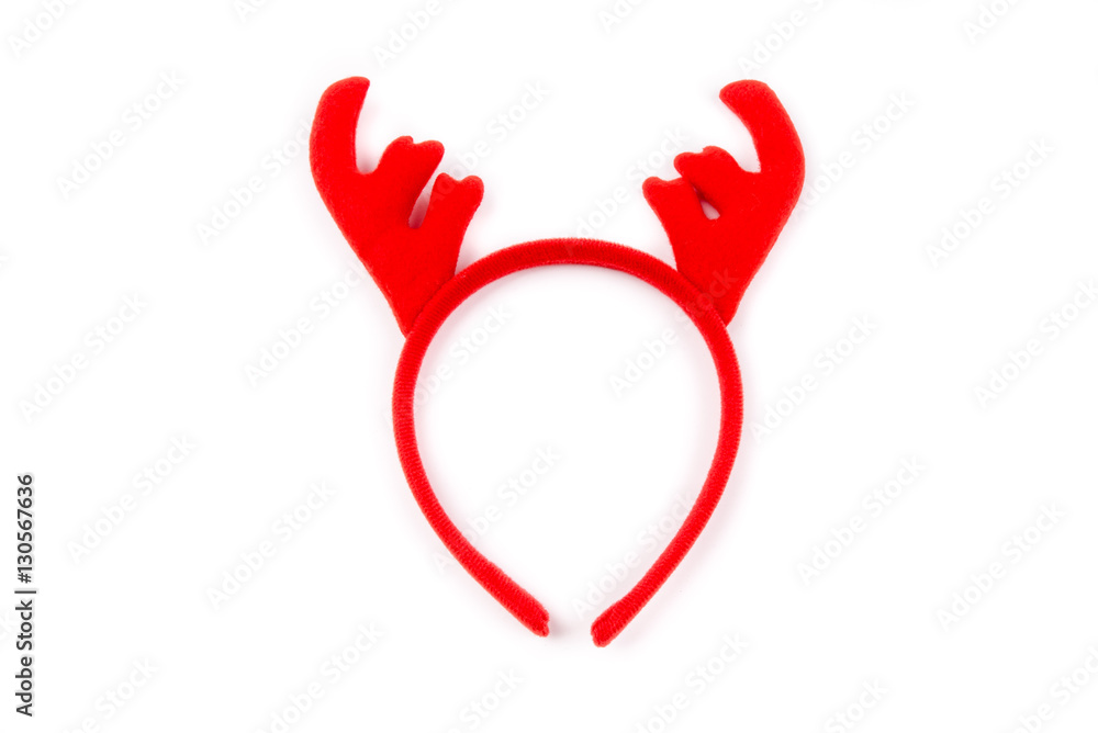 Funny Christmas antlers of a deer. Colorful reindeer antlers headband. Isolated on white background. Closeup. Funny Christmas antlers of a deer. Colorful reindeer antlers headband. Isolated on white background. Closeup.