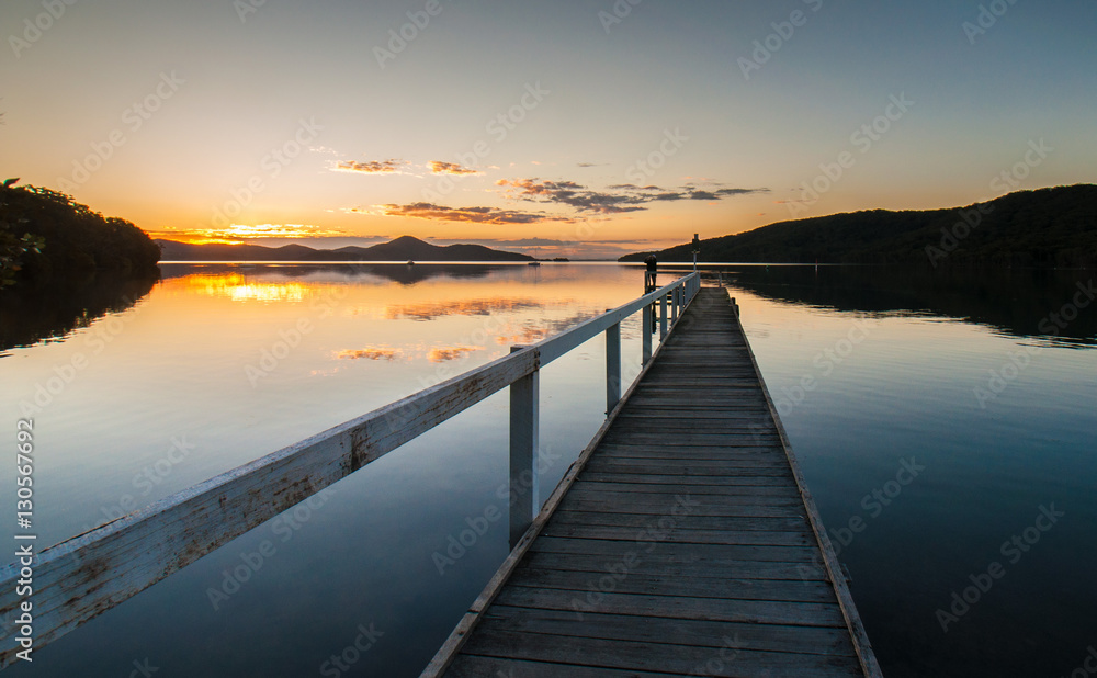 Obraz premium Pier View of Walls Creek at Sunset