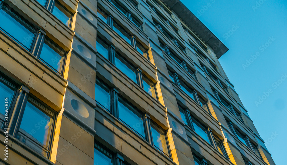 orange office facade with sunlights orange office facade with sunlights