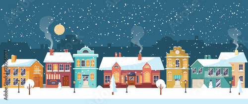 Snowy Christmas night in the cozy town, panorama