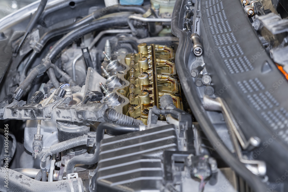 Car repair service, Auto mechanic repairing car engine Car repair service, Auto mechanic repairing car engine