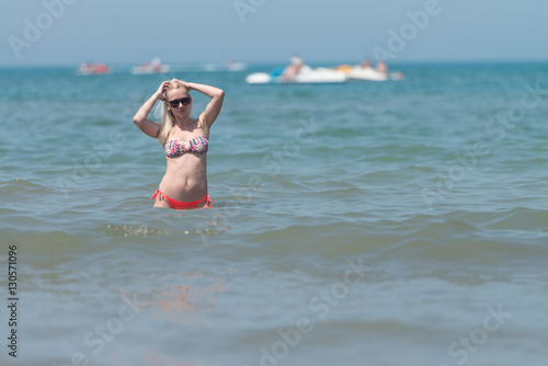 Woman In Bikini At Tropical Beach