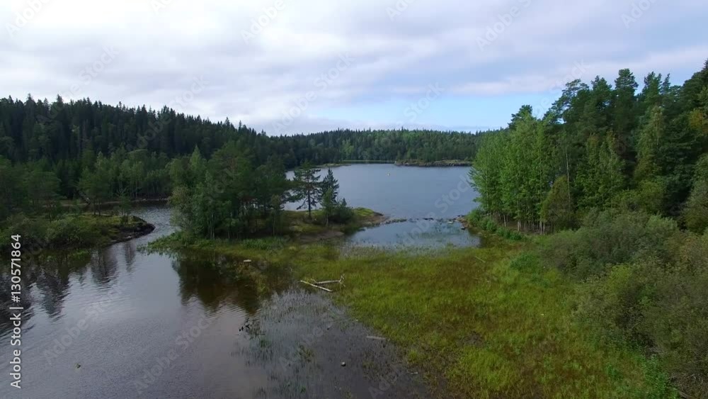 The landscape of the island of Valaam. The camera flies over water and forest. Journey to the Holy places. The landscape of the island of Valaam. The camera flies over water and forest. Journey to the Holy places.