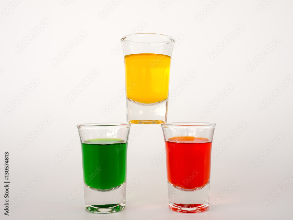 Colored glass on white background. Colored glass on white background.