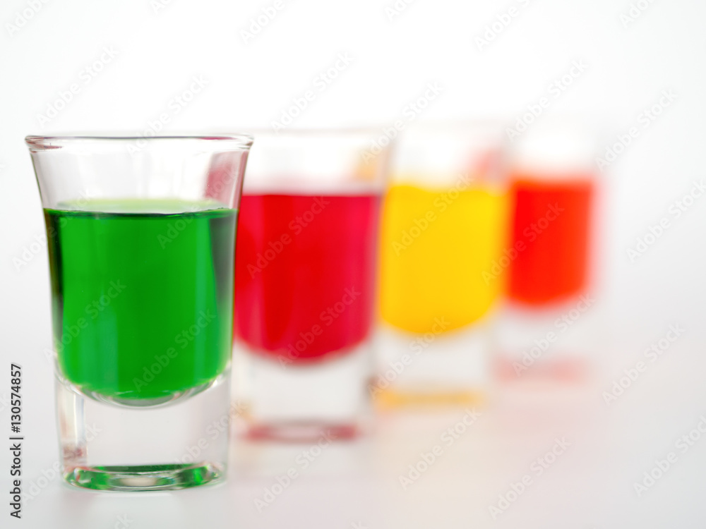 Colored glass on white background. Colored glass on white background.
