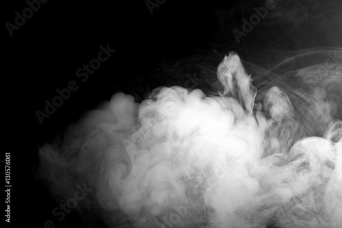 Background of abstract grey color smoke isolate on black color background. with copy space
