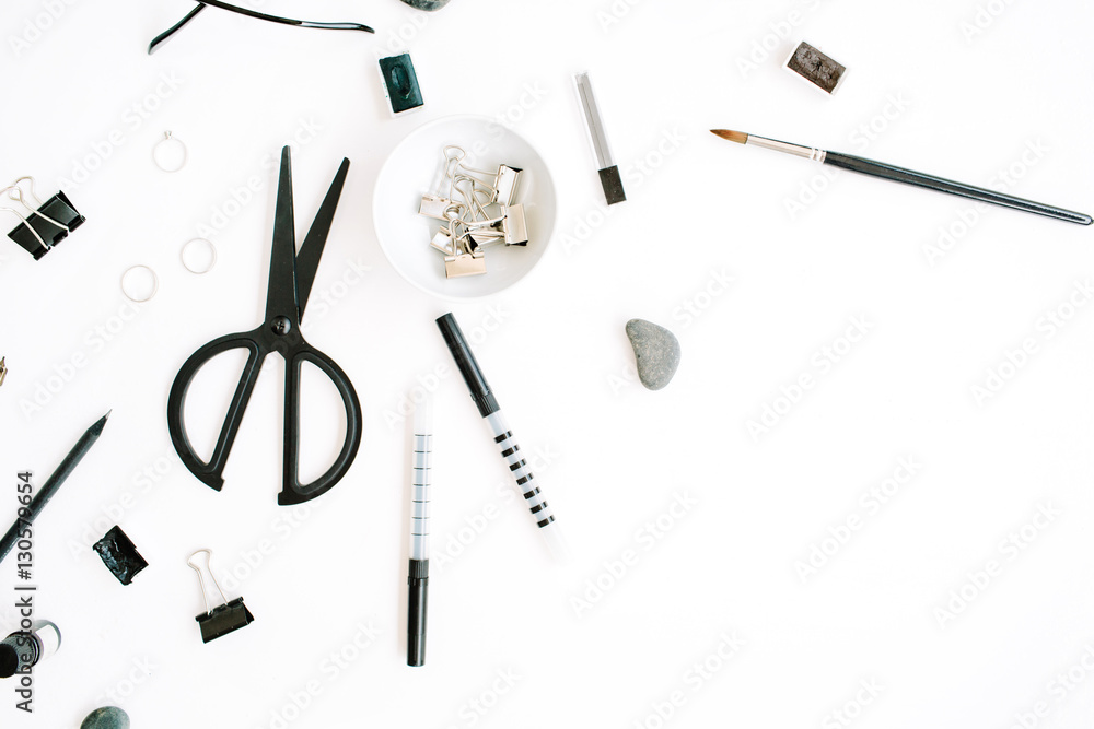 Flat lay, top view office table desk. Workspace with scissors, glasses, pen on white background. Flat lay, top view office table desk. Workspace with scissors, glasses, pen on white background.