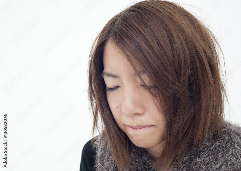 Young woman closing eyes