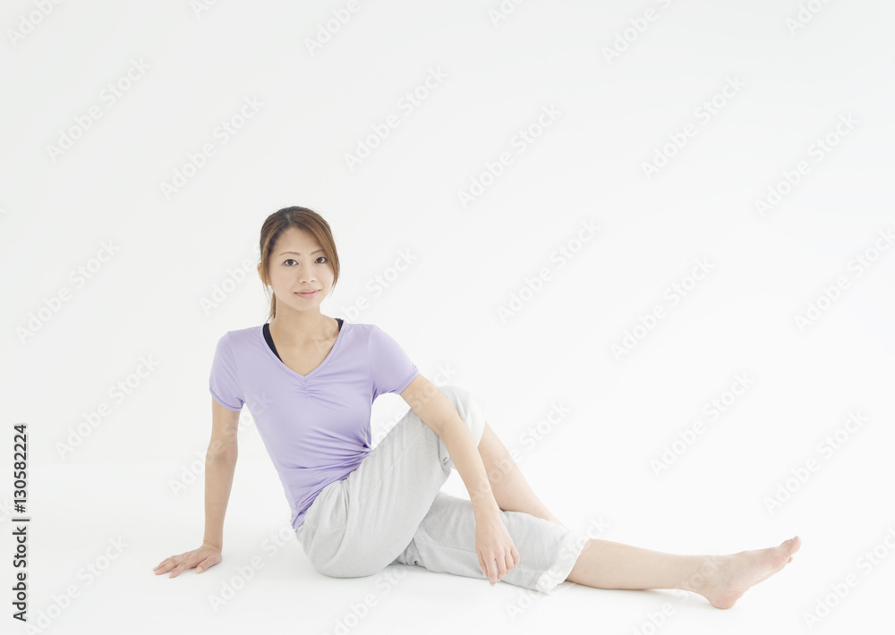 Young woman stretching Young woman stretching