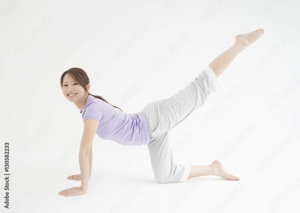 Young woman doing yoga