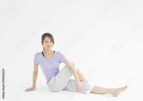 Young woman stretching