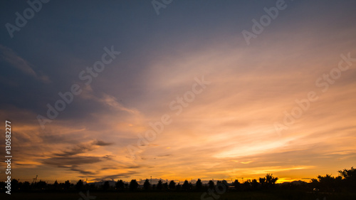 Sunset or sunrise with cloud and ray light on blue sky