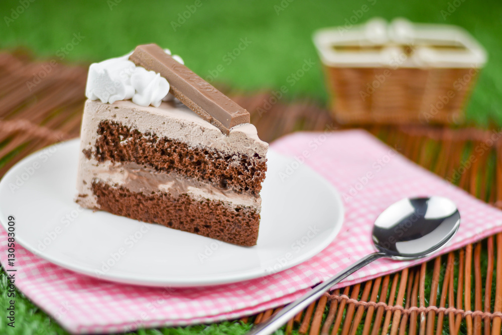 chocolate cake with whip cream and chocolate wafer topping chocolate cake with whip cream and chocolate wafer topping