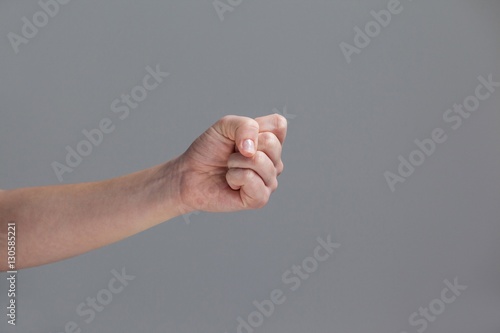 Close-up of clenched fist of a woman