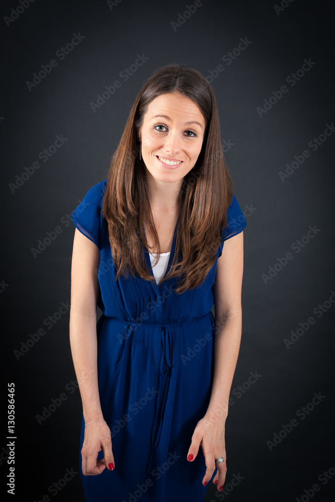 Obraz premium Beautiful woman doing different expressions in different sets of clothes: love