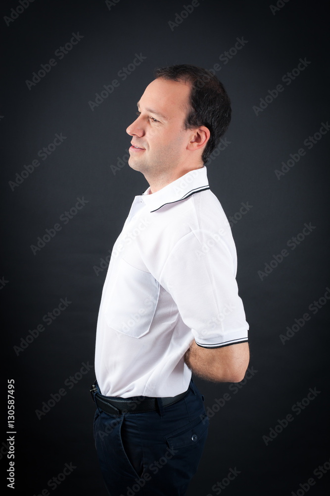 Handsome Man doing different expressions in different sets of clothes: backache Handsome Man doing different expressions in different sets of clothes: backache