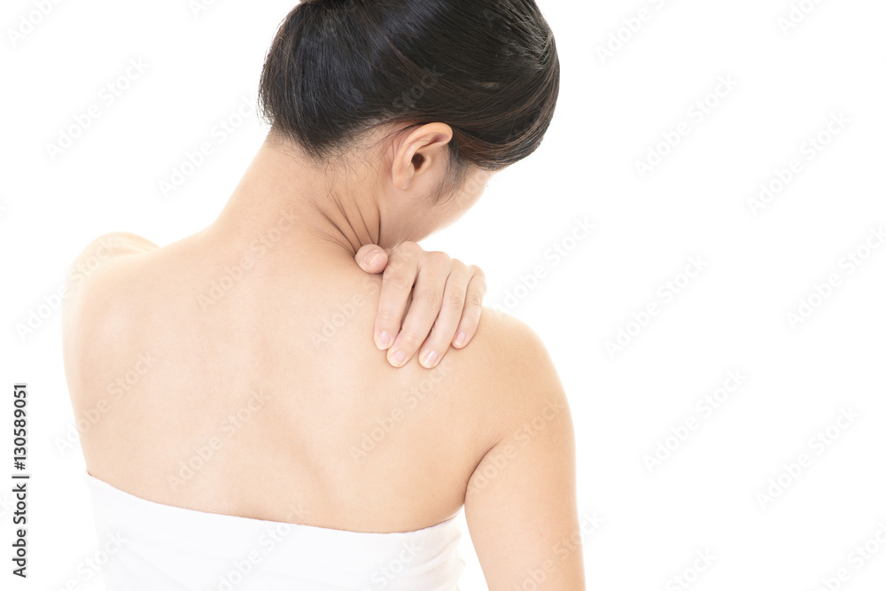 肩こりを訴える女性