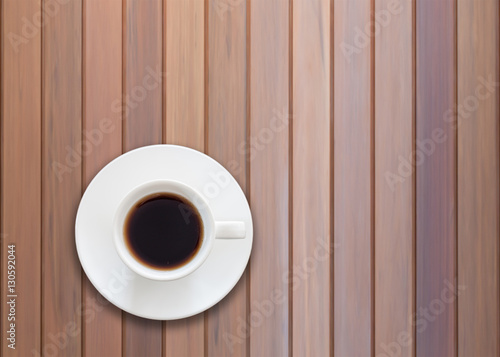 Top view of cup on wooden background