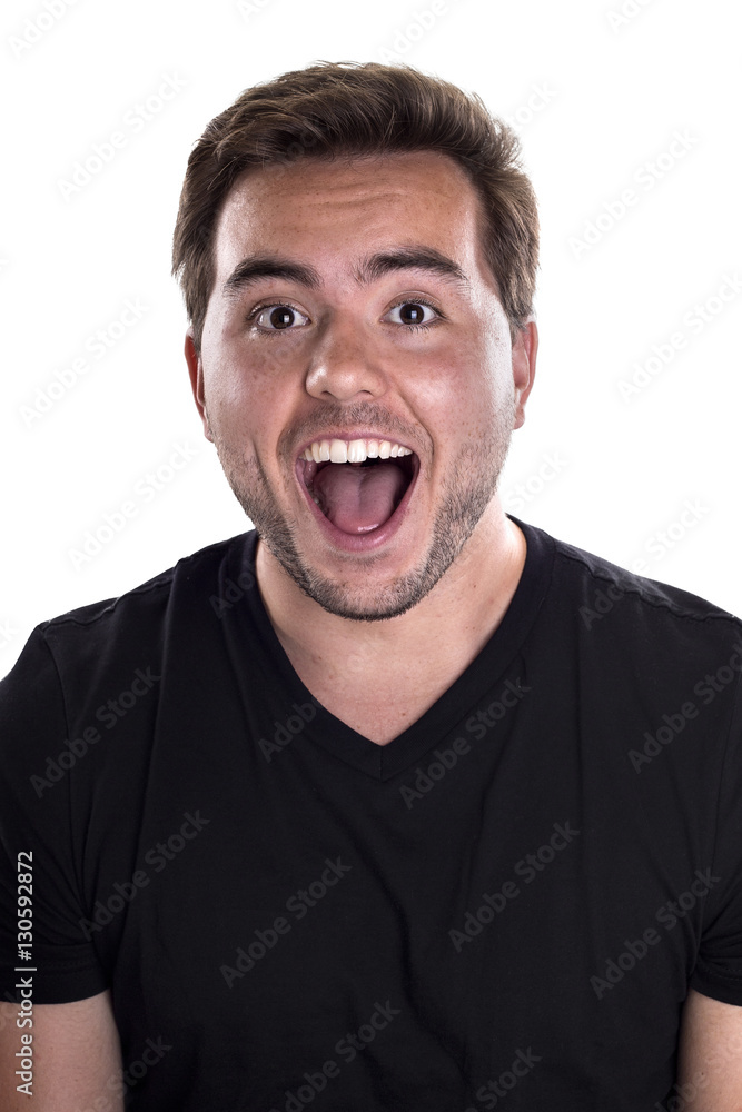 Portrait of a happy ecstatic male on a white background. He is ...