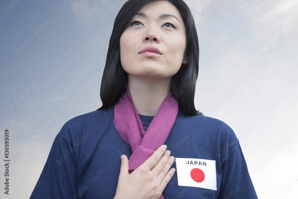 Φωτογραφία Young woman supporting the Japan women's national football team