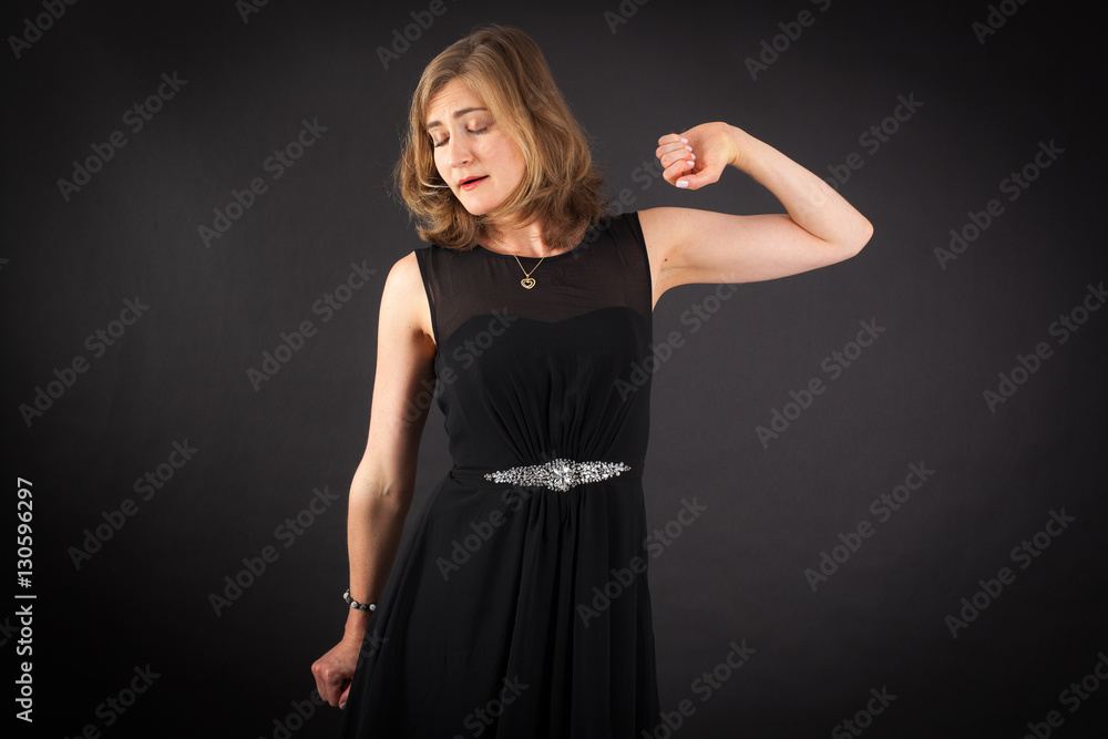 Beautiful woman doing different expressions in different sets of clothes: wake up Beautiful woman doing different expressions in different sets of clothes: wake up