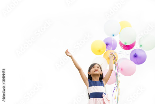 Happy Girl Holding Balloons With White Background. Isolated picture style. © aFotostock