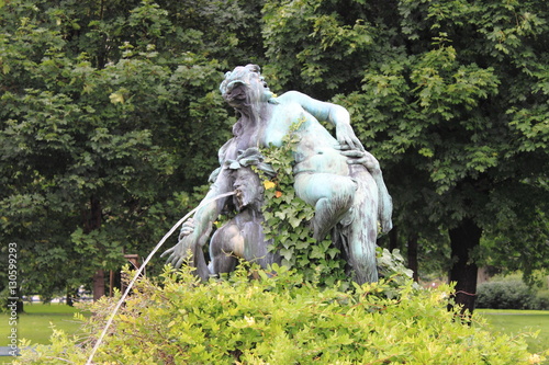 Sculpture of Triton and Nymph at Volksgarten in Vienna, Italy photo