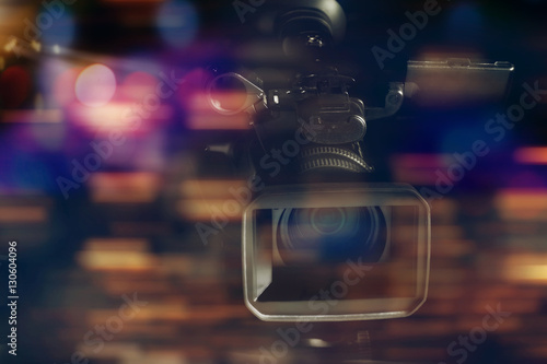 professional video camcorder in studio with blurred background photo