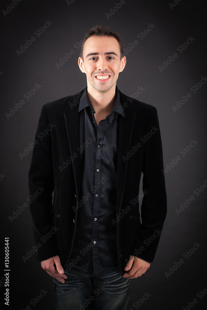Obraz premium Handsome man doing different expressions in different sets of clothes: smile