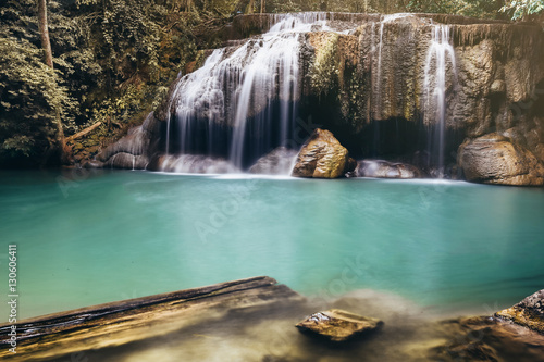 Arawan waterfall in tropical forest Thailand leaf moving low speed shutter blur Waterfall in forest of kanchanaburi Deep forest Waterfall in Kanchanaburi  Thailand