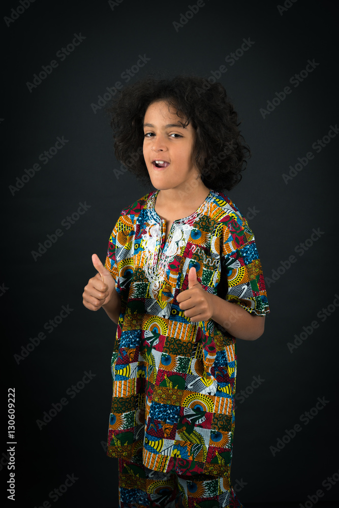 Handsome boy doing different expressions in different sets of clothes: thumbs up Handsome boy doing different expressions in different sets of clothes: thumbs up