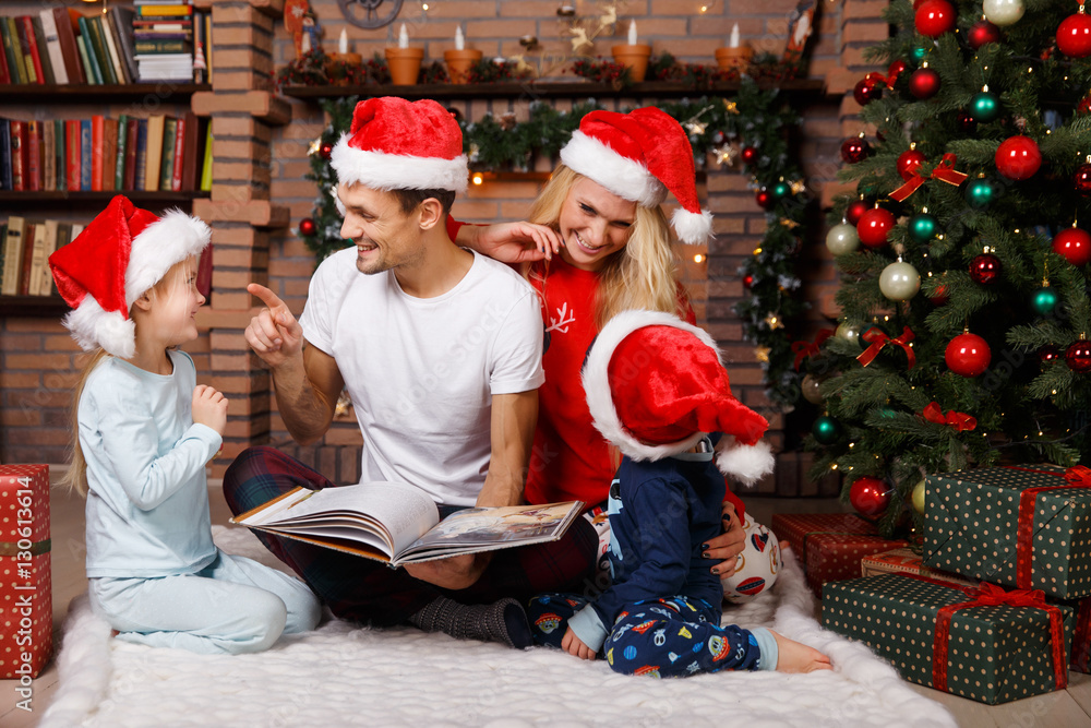 Parents with children in hats Parents with children in hats