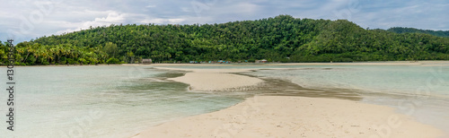 Sandy Bank in front of Local Village on Monsuar Island. Raja Ampat, Indonesia, West Papua photo