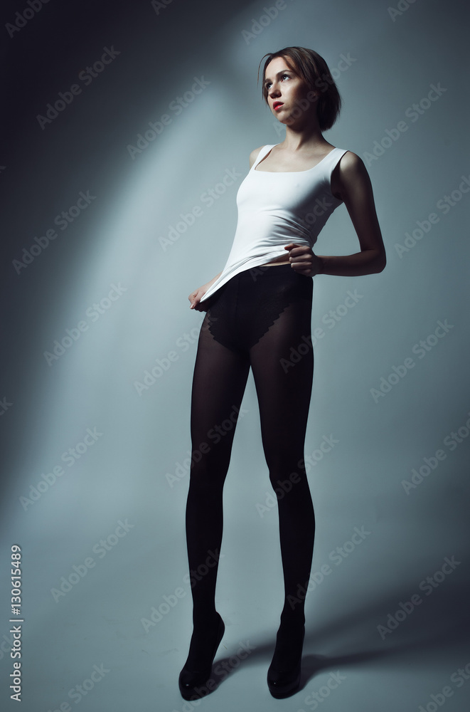 Young fashion model posing in studio Young fashion model posing in studio