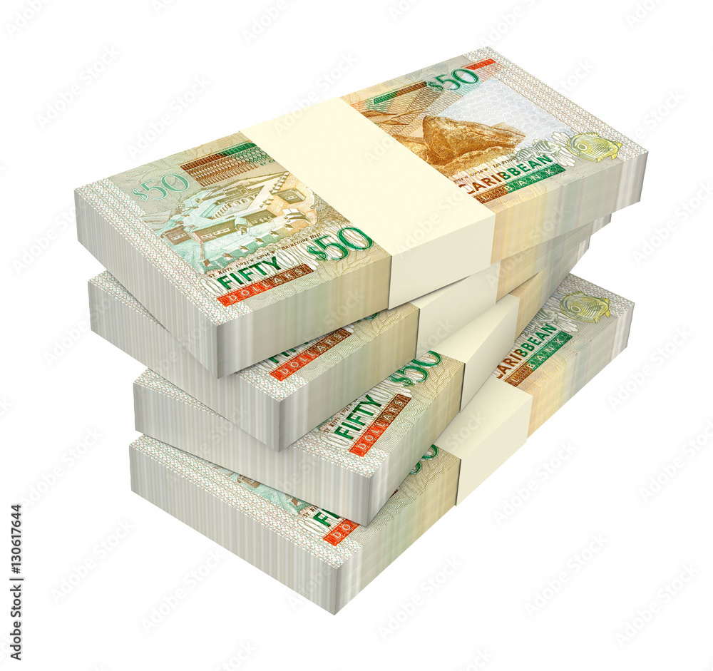 Eastern Caribbean dollar bills isolated on white background. 3D illustration. Eastern Caribbean dollar bills isolated on white background. 3D illustration.