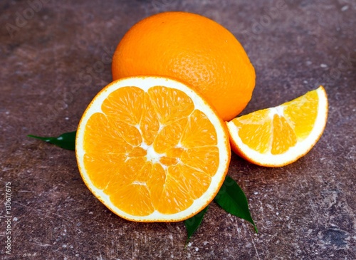 juicy fruit orange  on a dark background