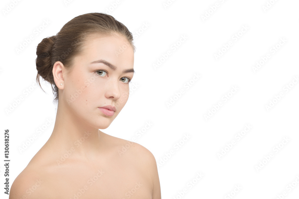 Woman with a natural beauty makeup look isolated over a white background with copyspace Woman with a natural beauty makeup look isolated over a white background with copyspace