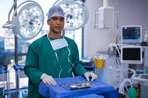 Portrait of surgeon standing in operation room